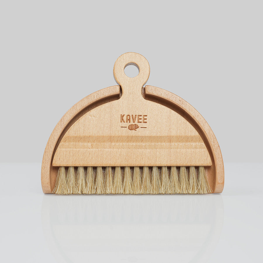 kavee dustpan and brush set on grey background