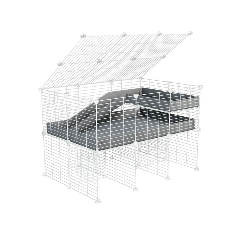A 2x3 C and C guinea pig cage with stand loft ramp lid small size meshing safe white C and C grids grey correx sold in UK