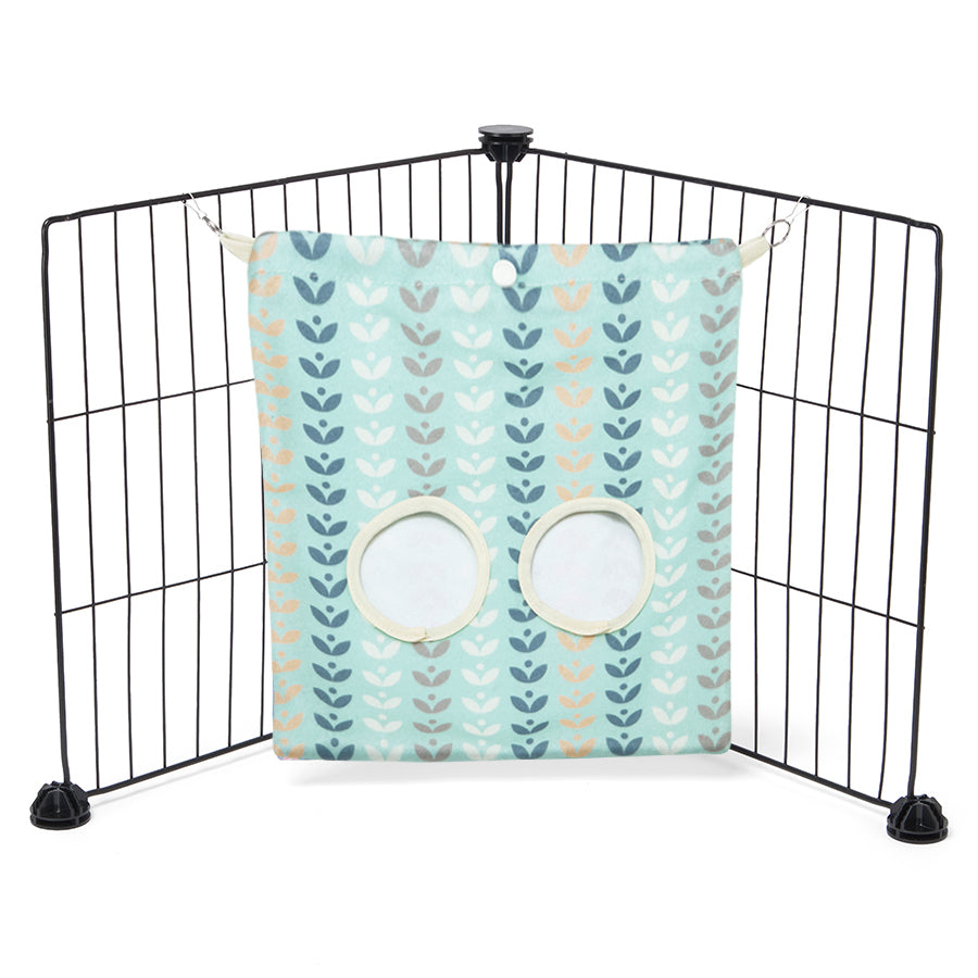 a guinea pig haybag hung on C&C cage made of abstract fleece by kavee