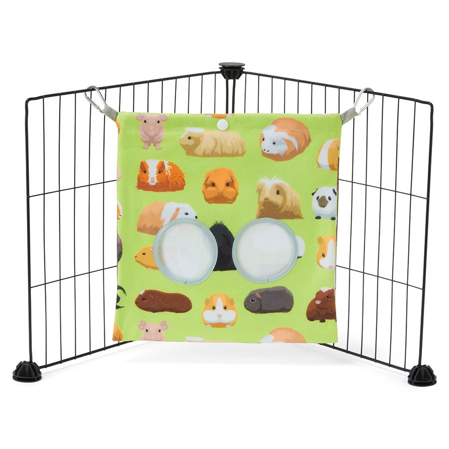 a guinea pig haybag hung on C&C cage made of green guinea pig fabric fleece by kavee