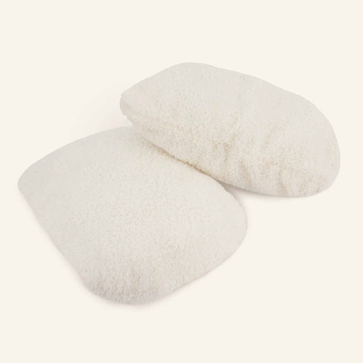 The Nest™ Spare Cushions, two cream sherpa cushions