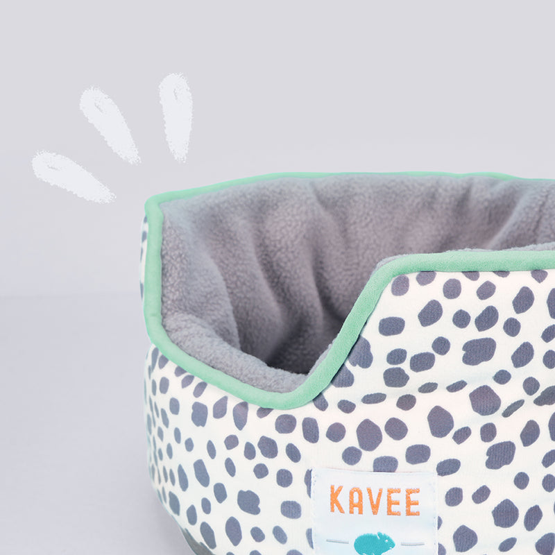 Kavee dalmatian print cuddle cup on grey background with illustration