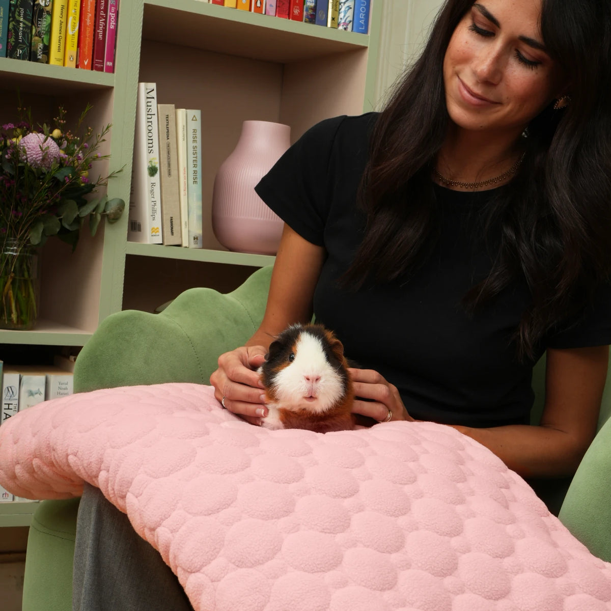 The Cloud™ Fleece Liner in Powder Pink, in a guinea pig habitat