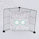 Kavee dalmatian print haybag hanging from two black c&c grids on grey spotted background