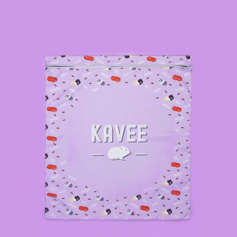 GIF Of KAVEE purple laundry bag being loaded with fleece accessories on purple background
