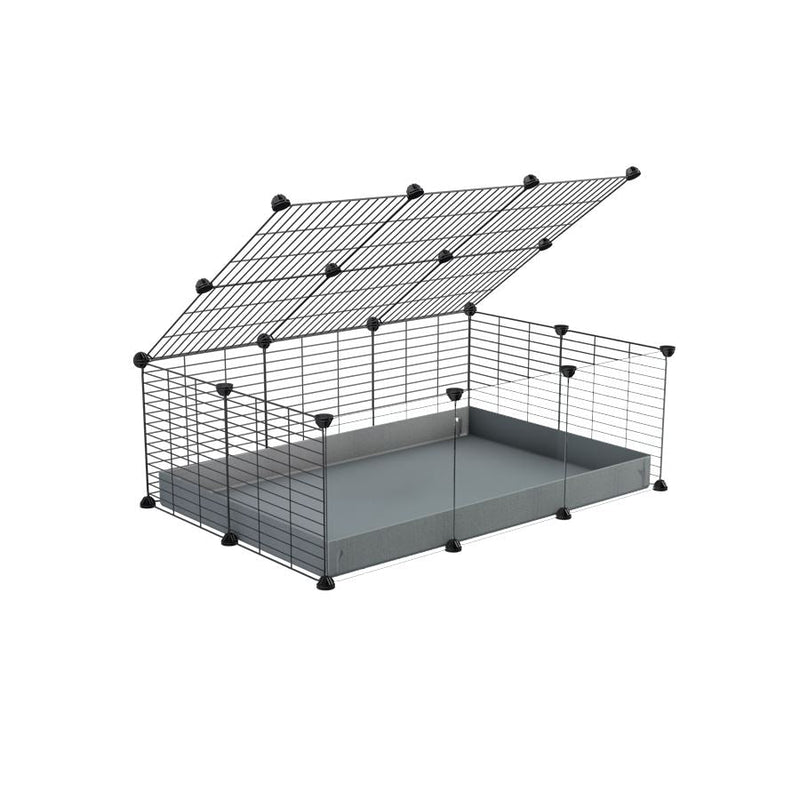 A 2x3 C and C cage with clear transparent plexiglass acrylic grids  for guinea pigs with grey coroplast a lid and small hole grids from brand kavee