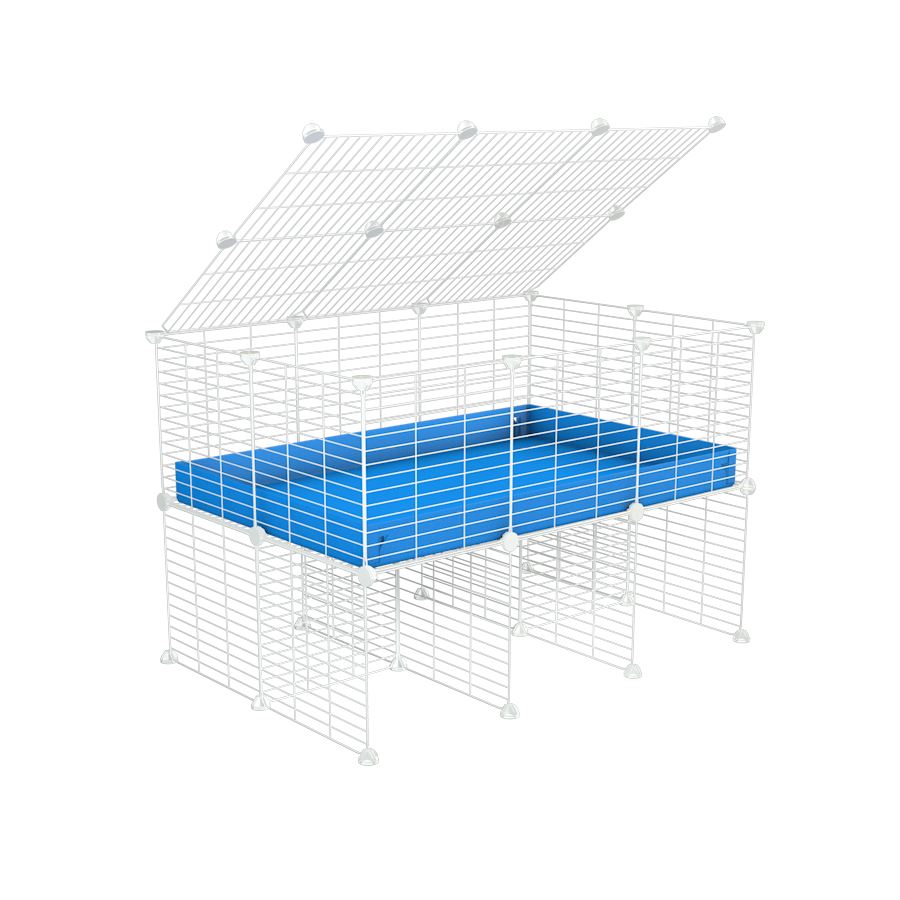 a 3x2 C&C cage for guinea pigs with a stand and a top blue plastic safe white C and C grids by kavee