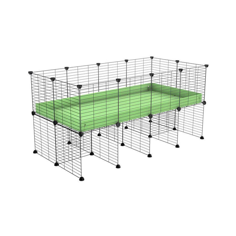 a 4x2 CC cage for guinea pigs with a stand green pastel pistachio correx and 9x9 grids sold in Uk by kavee