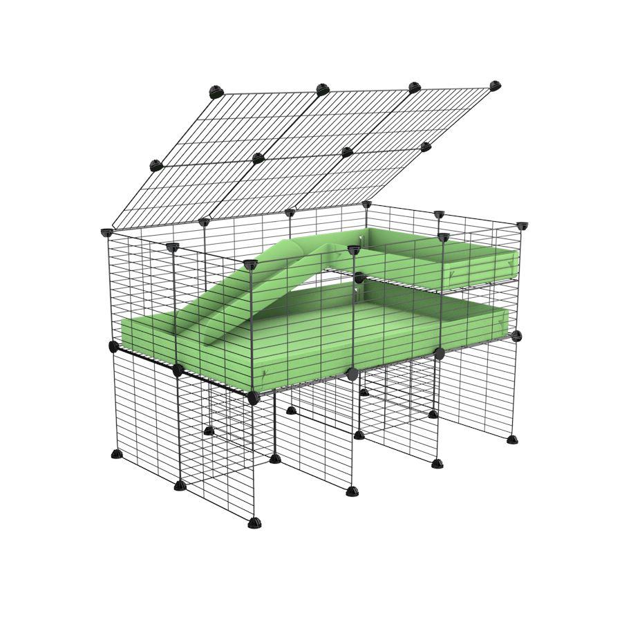 A 2x3 C and C guinea pig cage with stand loft ramp lid small size meshing safe grids green pastel pistachio correx sold in UK