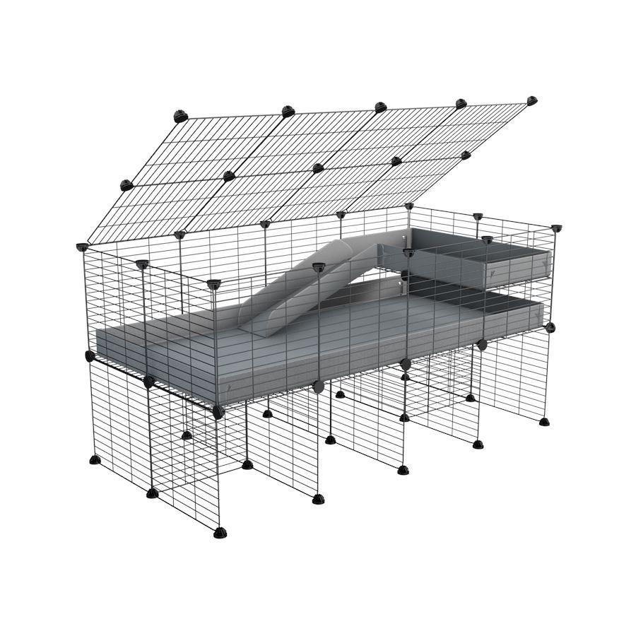 A 2x4 C and C guinea pig cage with stand loft ramp lid small size meshing safe grids grey correx sold in UK