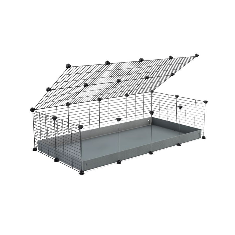 A 2x4 C and C cage with clear transparent plexiglass acrylic grids  for guinea pigs with grey coroplast a lid and small hole grids from brand kavee