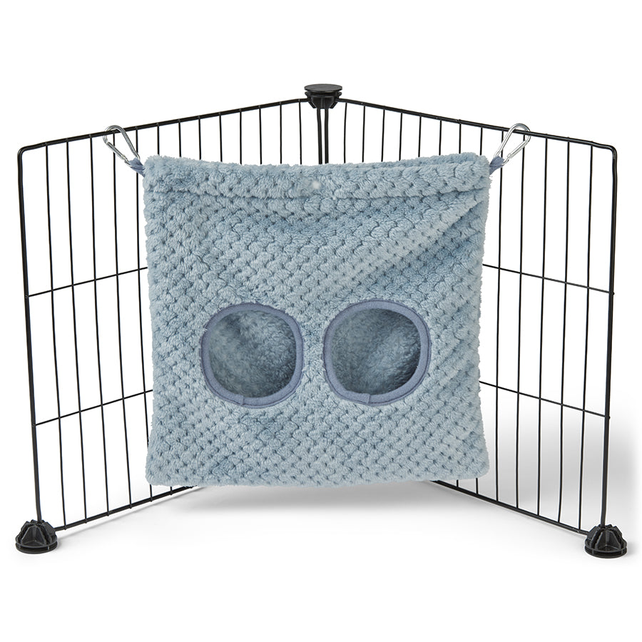 a guinea pig haybag hung on C&C cage made of blue fleece by  kavee