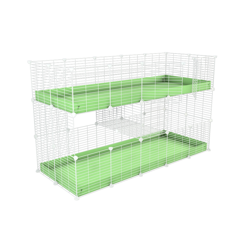 A two tier white 5x2 c&c cage for guinea pigs with two levels green pastel correx baby safe grids by brand kavee in the uk