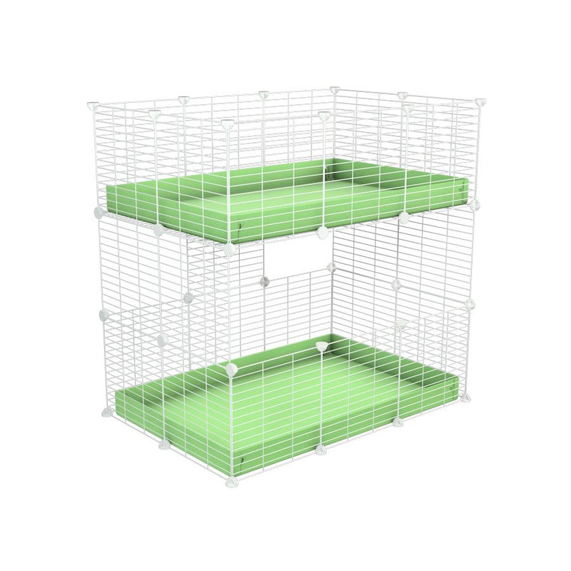 A two tier 3x2 c&c cage for guinea pigs with two levels green pastel correx baby safe white grids by brand kavee in the uk