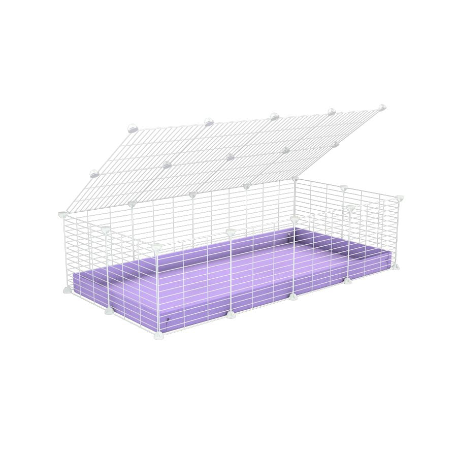 A 2x4 C and C cage for guinea pigs with purple lilac pastel coroplast a lid and small hole white grids from brand kavee