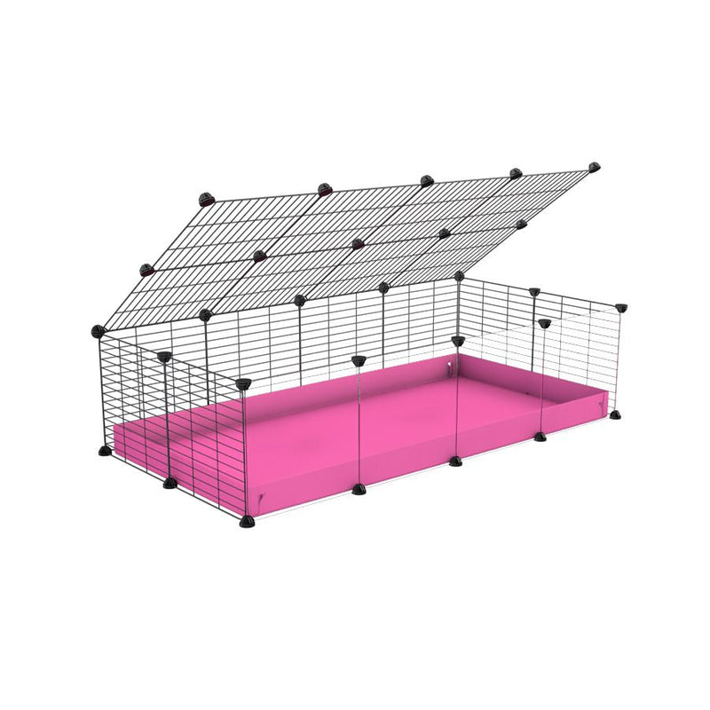 A 2x4 C and C cage with clear transparent plexiglass acrylic grids  for guinea pigs with pink coroplast a lid and small hole grids from brand kavee