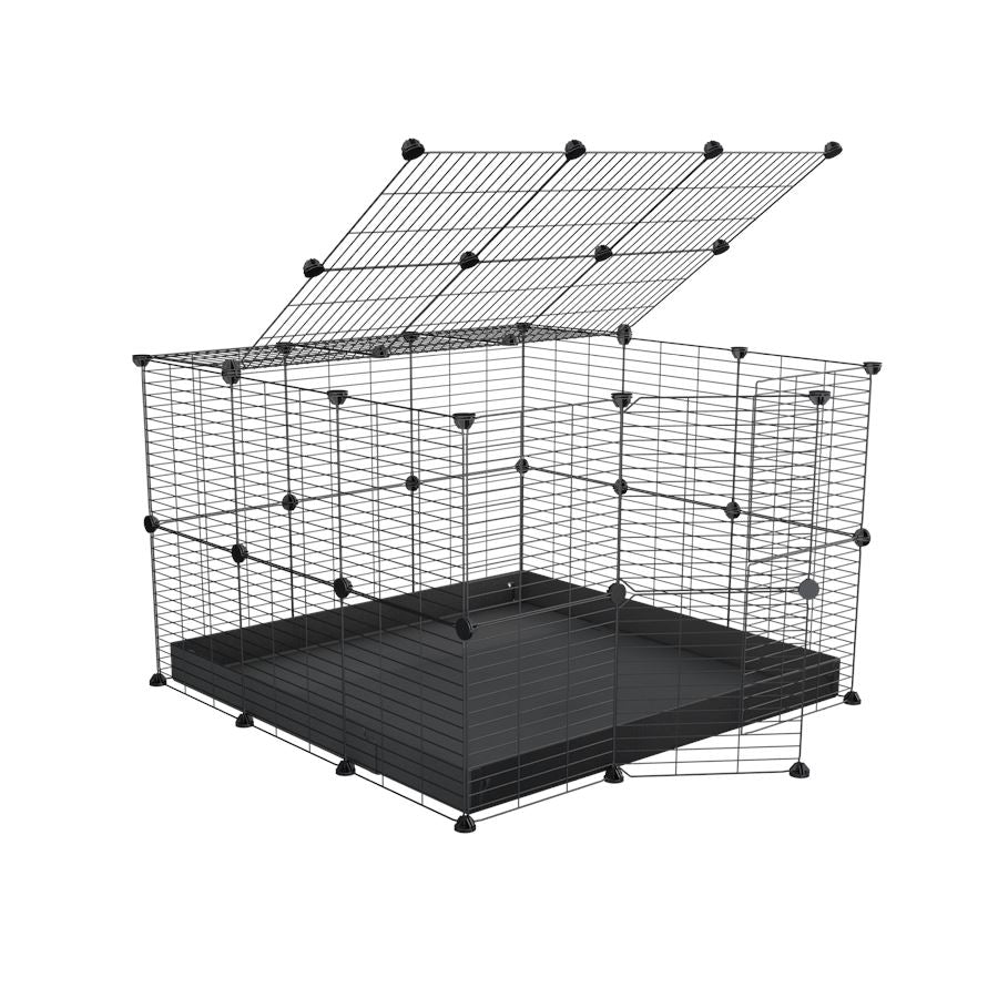 A 3x3 C and C rabbit cage with safe small size baby grids and black coroplast by kavee UK