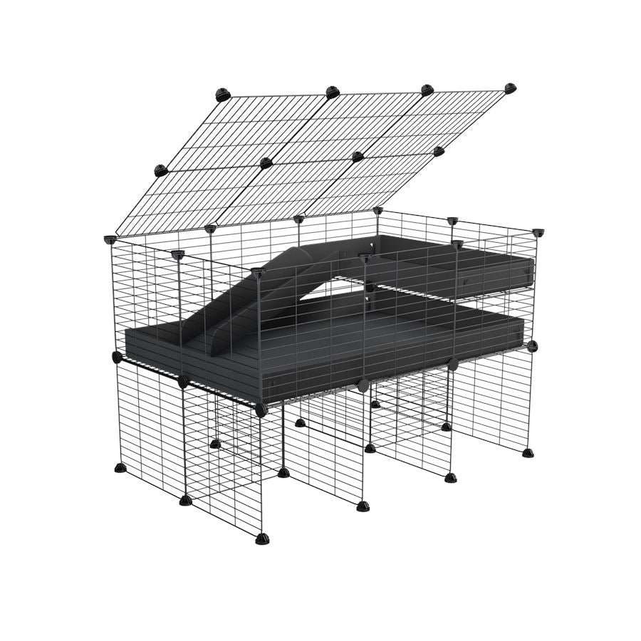 A 2x3 C and C guinea pig cage with stand loft ramp lid small size meshing safe grids black correx sold in UK