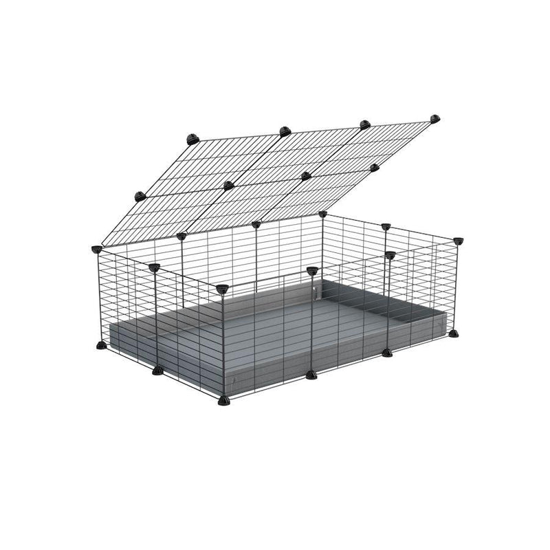 A 2x3 C and C cage for guinea pigs with grey coroplast a lid and small hole grids from brand kavee