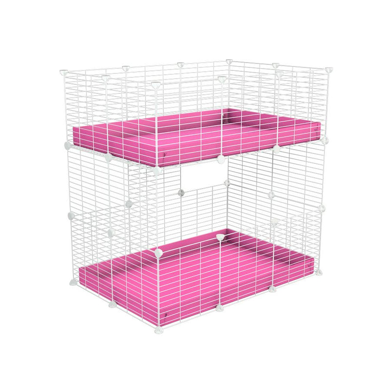 A two tier 3x2 c&c cage for guinea pigs with two levels pink correx baby safe white grids by brand kavee in the uk