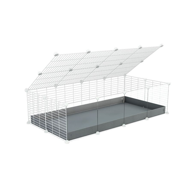 A 2x4 C and C cage with clear transparent plexiglass acrylic grids  for guinea pigs with grey coroplast a lid and small hole white CC grids from brand kavee
